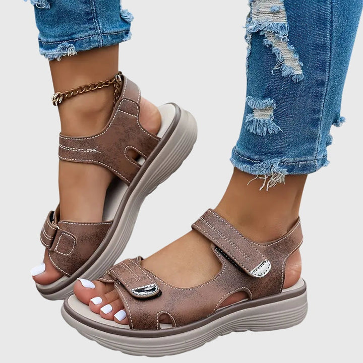 Orthopaedic comfortable sandals with supportive design for all-day comfort, featuring adjustable straps and cushioned footbed, ideal for foot health and style. 4